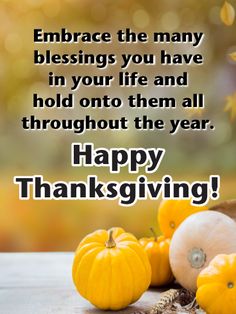 some pumpkins and gourds on a table with the words, embrace the many blessing