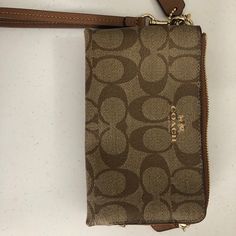 Never Used Wristlet Wallet With Double Zipper Pockets! Very Spacious For A Wristlet Great Condition Brown Crossbody Wallet With Zipper Closure, Coach Gold Wristlet For Everyday Use, Gold Coach Wristlet For Everyday, Coach Gold Clutch Wristlet, Coach Gold Rectangular Wristlet, Gold Coach Clutch Wristlet, Gold Rectangular Coach Wristlet, Coach Brown Wristlet With Zipper Closure, Brown Clutch Wristlet With Cell Phone Pocket