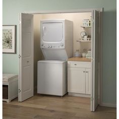 a washer and dryer in a small room