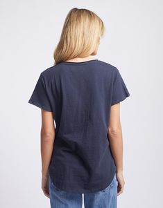 DESCRIPTION Have you been looking for the perfect everyday t-shirt? Look no further than the Original V-Neck T-shirt from White & Co. Designed to be the tee that you know you can reach for to look stylish and be comfortable! Crafted from ultra-soft cotton jersey, this stylish women's t-shirt features a v-neckline, short sleeves, and a flattering scoop hem. We are sure you will want one of these in every colour! Wear it with everything from jeans to skirts, this everyday essential is the perfect Perfect Foundation, Look Stylish, Women Supporting Women, Navy Color, Quality Fashion, Stylish Women, Body Shapes, Fabric Care, Everyday Essentials Products