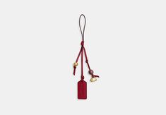 Heritage Bag Charm | COACH Leather Travel Bag With Logo Charm, Rectangular Logo Bag Charm, Designer Leather Bags With Logo Charm, Leather Bag Charm With Interior Key Chain For Travel, Logo Charm Bag For Everyday Use, Bag Charms Aesthetic, Charms Aesthetic, Backpack Charm, Large Wallet