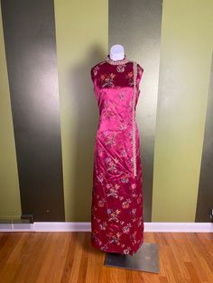 1960’s deep pink satin cheongsam with gold trim. Zips up the back, fully lined. A couple of tiny stain spots, but they blend in pretty well. Some underarm wear, shown in photoWomen’s small/mediumBust: 36”Hips: 38”Shoulder to hem: 56” Formal Fitted Pink Cheongsam, Traditional Fitted Pink Cheongsam, Girls Peasant Dress, Funky Dresses, Dress Halloween Costume, Peasant Dress, Deep Pink, Small Photos, Halloween Dress