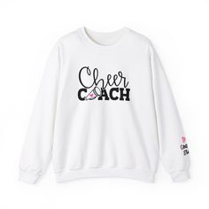 Personalized Cheer Coach Sweatshirt - Custom Name | Cheerleading Team Gift Celebrate your cheer coach with our personalized sweatshirt, designed to honor their dedication and leadership! Each sweatshirt is carefully customized with the coach's name, making it a heartfelt and unique gift for any occasion. PRODUCT DETAILS: -Materials: Made with a medium-heavy fabric blend of 50% cotton and 50% polyester (8.0 oz/yd² (271.25 g/m this sweatshirt feels cozy and is the perfect choice for those colder months. -Personalization: Customized with [Coach's Name] in a stylish font (Please specify the name in personalization box) Why Choose Our Sweatshirt? - Customized Just for You: Each sweatshirt is made-to-order with the coach's name, ensuring a personal touch. - Quality Materials: Crafted from a soft Cheerleading Team Gifts, Coach Sweatshirt, Sweatshirt Customized, Cheer Coach Shirts, Competition Cheer, Sideline Cheer, Cheer Coach Gifts, Varsity Cheer, Coach Shirt