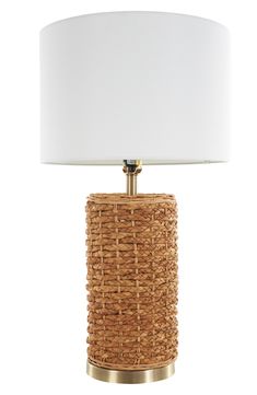 Illuminate your space with a touch of style. Perfect for any room, this table lamp will make a refreshing and stylish addition to your space. 15" x 15" x 28" lamp; 73" cord Rattan/textile/metal/plastic Imported Small Boho Table Lamp, Rattan Table With Modern Lamp, Rattan Side Lamp, Boho Table Lamp, Wicker Rattan Table Lamps, Rattan Shade Table Lamp, Rattan Table, Sports Blazer, Home Decor Lights