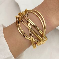 Experience the bold and unique design of the Irregular Open Cuff Bracelet. Let this statement piece spark conversation and elevate your style to a whole new level! Open Bangle Bracelet, Elegante Y Chic, Open Cuff Bracelet, Open Bangle, Estilo Punk, Style Punk, Bangle Designs, Elegant Chic, Bangles Jewelry