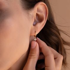 D I A M O N D ∙ F L O W E R ∙ D R O P ∙ H O O P S When you need something to boost your mood, why not add a bit of sparkle? Our Diamond Flower Drop Earrings are dainty and minimalist to allow for that subtle yet glowing look. Styled with a flowy and lightweight outfit, you will never want to take them off. * Material: High Quality Solid 925 Sterling Silver  * Finish: Sterling Silver ∙ 18K Gold * Hoop Dimensions: ~8.5mm Inner Diameter | ~11mm Outer Diameter * Featuring Huggie Hoops with a danglin Minimalist Hypoallergenic Flower Earrings For Wedding, Tiny Minimalist Flower Earrings, Elegant Tiny Hoop Earrings, Elegant Everyday Flower Earrings With Ear Wire, Minimalist Flower Earrings, Minimalist Hypoallergenic Flower Earrings, Minimalist Flower Earrings For Anniversary, Minimalist Flower Earrings For Anniversary With Pierced Ears, Initial Tag Necklace