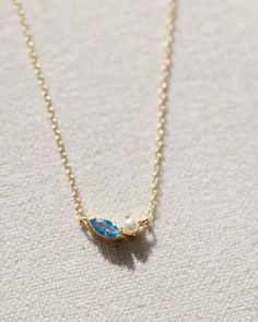 Looking for jewelry christmas gift ideas? You'll love the Gold Ocean Necklace. It is crafted with 14k gold vermeil and features a beautiful pearl paired with an ocean blue gemstone. This dainty gold necklace has an adjustable design allowing for a perfect fit, making it a versatile and timeless piece for any jewelry collection. Shop Coast + Cove Co for more preppy gift ideas to add to your christmas wishlist. Gold Necklace Stack, Pura Vida Necklace, Simple Necklace Everyday, Ocean Inspired Jewelry, Necklace Stack, Preppy Jewelry, Ocean Necklace, Pretty Jewelry Necklaces, Coastal Granddaughter