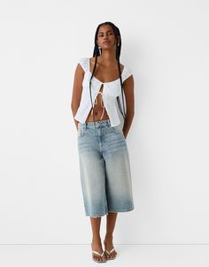 Baggy denim Bermuda shorts - New - Women | Bershka Jean Long Shorts, Summer Wide Leg Casual Jeans, Relaxed Fit Wide Leg Jeans With Built-in Shorts, Cotton Cropped Jeans For Summer, Relaxed Fit Cutoff Cropped Jeans, Relaxed Fit Cutoff Cropped Jeans With Five Pockets, Casual Cotton Cropped Jeans For Summer, High Waist Relaxed Fit Cropped Jeans For Summer, Casual Jean Shorts With Frayed Hem For Streetwear