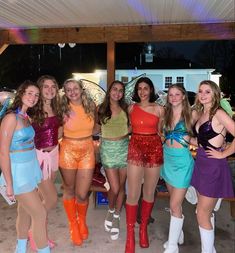 a group of young women standing next to each other