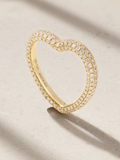 Anita Ko's ring is designed to resemble a heart, making it the perfect way to show someone how much you love them. It's cast from 18-karat gold and set with 1.50-carats of diamond that have been pavéd under a microscope and set by hand. Wear it on your middle or index finger. Luxury Yellow Gold Jewelry For Valentine's Day, Elegant Double Heart Promise Jewelry, Luxury Heart Cut Diamond Wedding Ring, Luxury Heart Cut Diamond Ring, Heart Cut Diamond Rings With Single Cut Diamonds, Elegant Double Heart Jewelry For Promise, Valentine's Day Fine Jewelry Rings With Single Cut Diamonds, Elegant Heart Cut Diamond Rings, Exquisite Yellow Gold Promise Ring