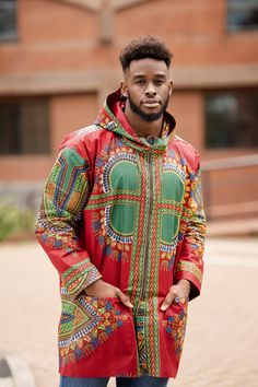 The African spirit collection is here! Wear clothing that releases your African spirit, and puts a smile on your face. That's exactly what this African summer jacket will do, the moment you put it on! We Are A Brand With A Purpose.  Feel Good in our clothing, knowing that we provide a positive social impact on the economy in West Africa. We source and produce everything in West Africa- providing over 30 full time jobs for the local community. See exactly who made your clothing directly on www.continentclothing.com This Jacket is perfect up until Autumn and can be used as a colourful overcoat in Winter with its oversized design. Hamed Hoodie features-     Hooded jacket Design     Oversized Overcoat Design     2 side pockets     Comfy fit     Drawstring hood     100% African Wax Print www.co Casual Red Outerwear With Stand Collar, Red Cotton Long Sleeve Windbreaker, Red Long Sleeve Cotton Windbreaker, Multicolor Cotton Outerwear With Stand Collar, Red Cotton Long Sleeve Outerwear, Red Hooded Cotton Outerwear, Red Cotton Hooded Jacket With Pockets, Casual Red Parka With Pockets, Rock Foundation