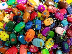 a pile of colorful beads sitting on top of each other