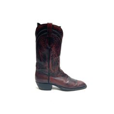 Vintage 1970s men's dark red marbled leather western cowboy boots by Lucchese. Features red and black marbled leather uppers, square rounded toe, medallion stitched vamp, mid calf rise, western motif at shaft, rounded tops, pull on loops, and slanted block heel. Excellent vintage condition.   Heel to toe (inside shoe): 11.75 inches  Ball of foot (bottom of sole): 4 inches  Heel height: 2 inches  Shaft height: 12.75 inches  Circumference: 13 inches  Size 10D 1970s Men, Inside Shoes, Mens Cowboy, Cowboy Western, Mens Shoes Boots, Western Cowboy Boots, 4 Inch Heels, Vintage 1970s, Western Boots