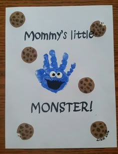 a handprinted card with cookie cookies on it that says, mommy's little monster