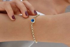 This 14k Gold Evil Eye Bracelet, Evil Eye Rolo Chain Gold Bracelet, 1 3 5 Blue Eyes Real Gold Station Bracelet is Gift for Her gift for Mother Bracelets that on photo are 8.0 mm evil eye bracelet and 9.0 mm evil eye bracelet Material: 14K Solid Gold (Real fine Gold) Gold color: Only yellow gold Available Eye Charm Size: 6 mm eye means ; 6.00 - 6.30 mm 7 mm eye means ; 7.50 - 7.70 mm 8 mm eye means ; 8.50 - 8.70 mm 9 mm eye means ; 9.50 - 9.70 mm 10 mm eye means ;10.20 - 10.30 mm You can customiz Gold Evil Eye Bracelet, Bracelet Evil Eye, Station Bracelet, Mothers Bracelet, Gift For Mother, Eye Bracelet, Chain Gold, Evil Eye Bracelet, Gorgeous Bracelet