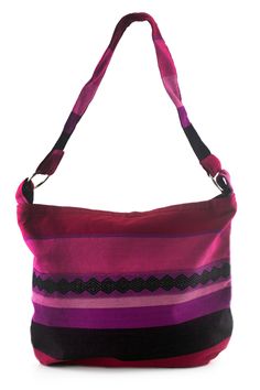 Luscious shades of purple fuchsia lilac and pink bring bold elegance to a shoulder bag adorned with black concentric diamonds. From Yama Aj Chixot Artisan Group the bag is sewn together by one team with a cotton fabric woven by another team of experts on the pedal loom. The shoulder bag has a pocket in the lined interior. The fabric for this bag is cut from a larger piece woven on a pedal loom therefore the order of colors and the positioning of the patterns my vary slightly resulting in a uniqu Purple Square Bag With Adjustable Strap, Purple Rectangular Hobo Bag For Travel, Purple Rectangular Hobo Bag With Adjustable Strap, Purple Hobo Tote Bag With Adjustable Strap, Purple Square Satchel For Travel, Purple Adjustable Strap Hobo Tote Bag, Purple Square Shoulder Bag For Everyday Use, Purple Tote Shoulder Bag With Adjustable Strap, Purple Satchel Shoulder Bag With Adjustable Strap