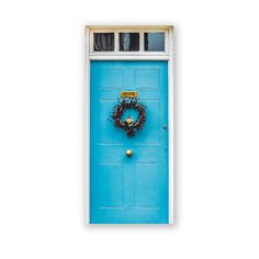 a blue door with a wreath on it