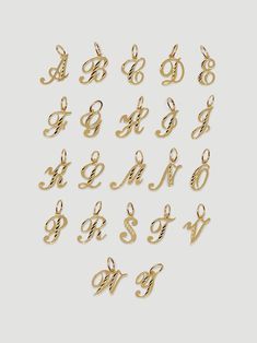 DESCRIPTIONLet everyone know the first letter of your name in style. Spell it out & add a solid gold Initial Pendant, or two, to your necklace stack.These cursive initial pendants feature diamond cuts to give them extra shine. See her shine in her full glory as The Initial Necklace. Q, U, X, Z letters coming soon DETAILS - always made in 14k gold- pendant height: 15mm- pendant width: 10mm Signature Gold Jewelry With Initials, Gold Signature Jewelry With Initials, Elegant Initial Pendant Charms, First Letter Of Your Name, Gold Initial Pendant, Necklace Stack, Alphabet Necklace, Diamond Initial Necklace, Ring Bracelet Chain