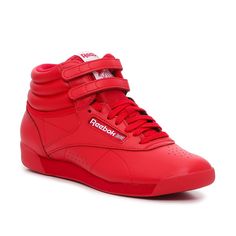 Reebok-Freestyle Hi High-Top Sneaker - Women's You can't go wrong with the retro-inspired Freestyle Hi high-top sneaker from Reebok. Created specifically for women and quickly became a fitness and fashion icon, this pair features a smooth leather upper and a sporty padded collar with hook and loop straps for a secure fit. High Tops For Women, Reebok Freestyle Hi, Reebok Retro, Reebok Freestyle, Red High Tops, High Tops Women, 90s Party, Rachel Weisz, Sport Shoes Women