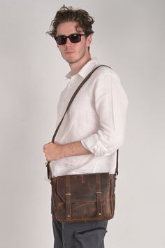 RusticVintage Men's Handmade Bag brings to you this Handmade bag which is suitable for carrying around your office stuff along with your daily items. The Handmade bag is made from PU Leather matterial and comes in an attractive colour. It is designed and can be used by Men & Boys.  Product Type: Cross body messenger travel Bag  Product description: Perfect messenger bag/shoulder bag/cross body bag/handbag/ hiking or travelling Bag, suitable for office, school, outdoor, business and other occasions. Freely adjustable shoulder strap, you can adjust it according to your height and comfort requirements. The White stitching on this product make it uniqe and attractive. Vintage Business Shoulder Bag With Waxed Finish, Vintage Bags With Laptop Sleeve For Everyday Use, Vintage Shoulder Bag With Luggage Sleeve For Everyday Use, Vintage Bag With Laptop Sleeve For Everyday Use, Vintage Crossbody Laptop Bag For Daily Use, Vintage Crossbody Briefcase For Everyday Use, Vintage Crossbody Shoulder Bag For Everyday Carry, Vintage Shoulder Laptop Bag For Everyday Use, Vintage Everyday Carry Shoulder Bag