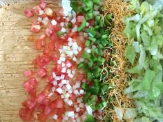 chopped up vegetables are sitting on a cutting board