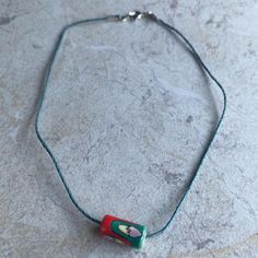 Glass/Ceramic Painted Cylinder Bead Pendant On A Blue Hemp Cord Choker Necklace, 14” Long. Message Me To Add An Extension Chain. Bead Is 90’s Vintage And It’s Painted Red/Orange, Green, Yellow And Pink. In Perfect Condition, Never Worn. Gold Heart Choker, Hemp Choker, Heart Necklace Tiffany, Long Message, Cord Choker, Lucky Brand Necklace, Heart Choker Necklace, Resin Pendant Necklace, J Crew Necklace