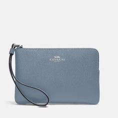 Coach Corner Zip Wristlet Silver / Marble Blue Leather Color: Silver / Marble Blue Crossgrain Leather Two Credit Card Slots Zip-Top Closure, Fabric Lining Wrist Strap Attached 6 1/4" (L) X 4" (H) X 1/2" (W) Style No. 58032 Blue Clutch With Zipper Pouch, Elegant Blue Coach Wallet, Blue Zipper Pouch Wristlet, Blue Elegant Wristlet For Everyday Use, Elegant Blue Wristlet For Everyday Use, Coach Blue Pouch Wristlet, Blue Coach Pouch Wristlet, Coach Blue Clutch For Everyday Use, Blue Coach Clutch For Everyday Use