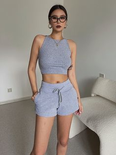 Grey Sports Shorts High Waist Student Loose Running Hot PantsFabric: BlendedColor: Black Khaki Light Grey Dark Grey Dark CoffeeSize: (unit cm)S Waist 60-70 Hips 88 Pants Length 27M Waist 64-74 Hips 90 Pants Length 28L Waist 68-78 Hips 92 Pants Length 29&ltp&gtWashing Suggestions: Hand wash recommended, hang to dry, do not bleach, low iron</p>&ltbr/>&ltp&gtPlease check the size carefully when you placing the order</p>&ltbr/>&ltp&gtFor more pictures please contact us</p>&ltbr/> Athleisure Short Pants For Gym, Short Athleisure Pants For Gym, Solid Color Summer Athleisure Joggers, Summer Stretch Sweatpants For Gym, Summer Workout Sportswear Sweatpants, Fitted Athleisure Joggers For Summer, Fitted Summer Athleisure Joggers, Casual Sleeveless Activewear With Pockets, Summer Stretch Joggers Sportswear