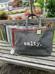 Salty Cotton Canvas Bag. Durable cotton canvas bag. Thick and cushioned 12 inches, shoulder length handles. Dimension: 22 inches in length and 14 inches tall, not including handle and 7 inches wide. Casual Canvas Shoulder Bag Gift, Casual Canvas Softback Bag, Green Cotton Satchel Bag, Rectangular Cotton Canvas Bag With Reinforced Handles, Casual Rectangular Canvas Bag With Canvas Lining, Casual Softback Bags With Reinforced Handles, Casual Everyday Canvas Bag With Handles, Casual Fabric Tote Bags, Large Canvas Bags With Handles