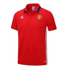 a red shirt with the manchester united crest on it and white stripes around the collar