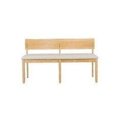 a wooden bench sitting on top of a white floor