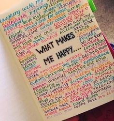 a notebook with writing on it that says what makes me happy