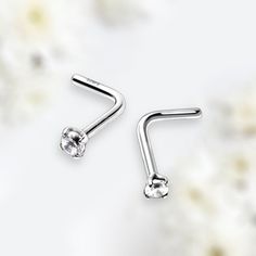 14k white gold 2mm clear gem top L shape nose studs. Thickness: 18 gauge & 20 gauge  Stone size: 2mm Material: 14 karat white gold. Sold individually. Minimalist Silver Piercings With Diamond Accents, Stud Nose Piercing, L Shaped Nose Ring, Gem Top, Nose Studs, Nose Jewelry, Nose Ring Stud, Nose Stud, Body Jewellery