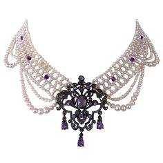 Gorgeous One of One Necklace by Marina J. This piece features a Vintage Victorian Inspired Silver Brooch with Amethyst and Crystal set within, reimagined into a stunning Centerpiece. The Centerpiece gives amazing shine and is attached to a Cultured Pearl band which is intricately woven into a Lace like design. Faceted Amethysts adorn the center of the Pearl band, as dramatic Draped Pearls embellish this necklace. This Statement One of A Kind Necklace measures 16 inches long, and meets at a decorative sliding Silver Clasp. ** Made by Marina J. ** ** For any questions or inquiries please direct message or email me ** Antique Pearl Jewelry, Extravagant Necklace, Purple Statement Necklace, Victorian Accessories, Silver Centerpiece, Czech Glass Necklace, Princess Jewelry, Big Necklace, One Of One