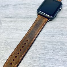 Monogrammed Vintage Leather Watch Band , Custom Hand Made Apple i-Watch Band, Inside out Leather Apple Watch Band, ANTIQUE Elegant Band This listing is for handmade apple watch strap. Apple Watch series 1, 2, 3 ,4, 5, 6 and SE This strap is so cool, it'll make you buy the i-watch. Please pick your watch's diameter. 38mm 40mm 42mm or 44 mm. ♦ Please note - this listing comes with 4 hardware color. ------------------------------------------ [ PRODUCT FEATURES ] ------------------------------------ Handmade Rectangular Apple Watch Band For Everyday Use, Handmade Adjustable Apple Watch Band, Adjustable Waxed Finish Apple Watch Band For Everyday Use, Adjustable Apple Watch Band With Waxed Finish For Everyday, Handmade Adjustable Watch Accessories For Everyday, Handmade Adjustable Watch Accessories, Handmade Brown Apple Watch Band, Custom Brown Leather Watch Bands, Custom Handmade Brown Watch Bands