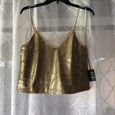 Forever 21. Gold Sequin Crop Top. Never Worn Before. Size Medium. Trendy Camisole Top For Party, Sequin Cami Tops For Party Season, Trendy Tank Top For Night Out In Fall, Spring Sequined Camisole Top, Sequined Spring Camisole Top, Sequin Spring Camisole Top, Sequin Camisole Top For Spring, Trendy Cami Top For Party, Fall Tank Tops For Night Out