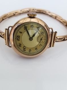 Trench watches are a passion of mine and this solid gold beauty is so reminiscent of the watches popular in the early 1900's..  The watch is circa 1910 Swiss made A second hand  Gold expanding bracelet  Gold case Full working order Excellent condition! The watch nestles comfortably on the wrist - the gold is beautifully smooth - a very tactile piece - elegant in its simplicity.  One can only wonder who wore this watch and under what circumstances - most definitely a loved and treasured item. The Vintage Watches Antique Gold Sekonda, Gold Beauty, Gold Armband, Gold Case, Women Wrist Watch, Contemporary Jewellery, Bracelet Gold, Wrist Watches, Gold Watch