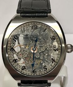 Stuhrling Mechanical Hand-Wind 17 Jewels movement, Fully Skeletonized Clear/Lightly Frosted Krysterna Crystal, 48mm Silvertone Stainless Steel Case (12.5mm thickness), exhibition backCase, W.R. 50 meters, Mens Watch with Black Alligator Embossed Leather Strap. Rare and a classic Condition is New with tags. Shipped USPS Priority mail Please contact me with any questions. Designer Business Watches With Skeleton Dial, Designer Leather Watch With Skeleton Dial, Designer Leather Watches With Skeleton Dial, Designer Black Watch With Skeleton Dial, Designer Silver Automatic Watch Accessories, Black Alligator, Skeleton Watches, Mechanical Hand, Mens Watches Black