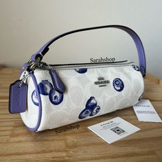 100% Authentic Brand New With Tags Cr369 Blueberry Printed Nolita Barrel Bag Chalk/Light Violet And Silver Hardware Approximate Measurements: 7.5″ (L) X 3″ (H) X 3″ (W) Handle With 7" Drop For Shoulder Wear Blueberry Coach Bag, Coach Barrel Bag, Coach Nolita, Pretty Sneakers, Silver Bag, Light Violet, Handbag Essentials, Girly Bags, Barrel Bag