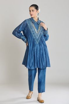 Blue pure chanderi silk kurta with sequin and mirror embroidery. Paired with a pant. - Aza Fashions Indigo Chanderi Sets For Navratri, Blue Resham Embroidered Pant Set For Wedding, Festive Blue Straight Kurta Pant Set, Blue Resham Embroidery Pant Set For Wedding, Festive Blue Pant Set With Straight Kurta, Blue Wedding Pant Set With Resham Embroidery, Blue Unstitched Pant Set For Eid, Unstitched Blue Pant Set For Eid, Eid Chanderi Indigo Sets