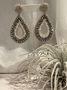 Just as pictured!! Beautiful Elegant Beaded Hoop Earrings For Party, White Teardrop Crystal Earrings For Party, Glamorous White Dangle Teardrop Earrings, Beaded Teardrop Jewelry For Evening, Party Beaded Chandelier Earrings, Elegant Teardrop Beaded Earrings For Party, Glamorous Beaded Dangle Earrings, Beaded Teardrop Jewelry For Party, Dangle Beaded Earrings For Party