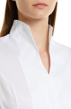 This picture-of-polish shirt is crafted from crisp poplin with a split neckline. Split neck Stand collar Long sleeves 71% cotton, 31% nylon, 4% spandex Hand wash, line dry Imported Poplin Blouse, Blouse Nordstrom, Stand Collar, Split, Hand Wash, Nordstrom, Spandex, Collar, Long Sleeve