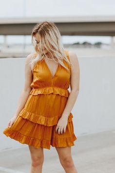 Sleeveless, ruffled, tiered dress.Maddie is wearing a size smallSkirt portion is linedSize Chart:Small: Waist: 26 in. Bust: 34 in.Medium: Waist: 28 in. Bust: 36 in. Large: Waist: 30 in. Bust: 38 in. This item is final sale. Small Skirt, Hey Babe, Boutique Gifts, Gift Boutique, Tiered Dress, Small Waist, Final Sale, Mustard, Return Policy