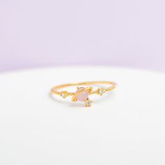 Need some space? Then this is the ring for you! Our I Need Space Ring features a Girls Crew signature pink gem that is so flirty and feminine. 18k gold plated, 18k rose gold plated, or rhodium plated over brass with a protective coating Cubic zirconia stones Available in sizes 6-8 5mm width Shop our entire GC Galaxy Collection here! Space Ring, Space Rings, I Need Space, Pink Gem, Necklace Chain Lengths, Cute Rings, Wrap Rings, Brass Pendant, Jewelry Cleaner