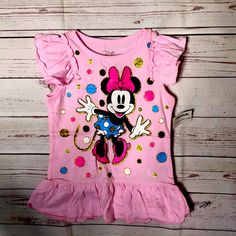 Disney Girls Minnie Mouse Graphic Shirt Disney Minnie Mouse Pink T-shirt, Fun Pink Minnie Mouse Top, Cute Pink Minnie Mouse T-shirt, Disney Pink Minnie Mouse T-shirt, Disney Minnie Mouse Summer Tops, Pink Disney Tops For Summer, Casual Pink Minnie Mouse Top, Cute Minnie Mouse Cotton Top, Cotton Minnie Mouse Shirt With Short Sleeves