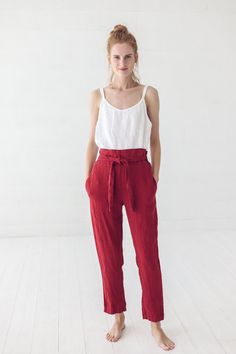 DETAILS * High waisted linen pants * With two side pockets and elastic band on the back * With stylish straps on the front * Made from soft wash medium weight (185 gsm) 100 % European linen fabric * Height of the model is 177 cm (5' 8") and she is wearing pants in size XS and ruby red colors * Height of the model is 165 cm (5′ 5″) and she is wearing pants in size S and dark gray color * Height of the model is 177 cm (5' 8") and she is wearing size XS pants in ruby red color * Please choose anoth Red Linen Pants, High Waisted Linen Pants, Summer Linen Pants, Pants High Waisted, Pants Elastic Waist, Linen Trousers, Linen Top, Linen Women, Linen Pants