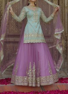 Mint and Light Purple Kurti Style Lehenga – Lashkaraa Luxury Purple Choli With Chikankari Embroidery, Luxury Purple Chikankari Embroidery Dupatta, Luxury Lavender Sharara With Dupatta, Heavy Net Fabric Dresses, Luxury Purple Lehenga For Eid, Luxury Lavender Dupatta With Pallu, Luxury Purple Anarkali Dress, Light Traditional Dresses, Luxury Lavender Dupatta With Intricate Embroidery