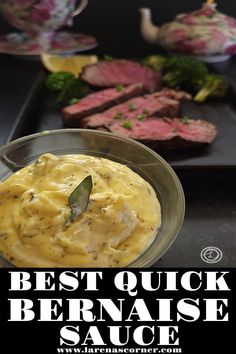 the best quick bernaise sauce is in a bowl with meat on the side