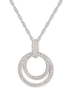 Get twice the sparkle with the glistening double circles of this elegant cubic zirconia pendant necklace. Macy's Silver Jewelry With Diamond Accents, Elegant Macy's Diamond White Necklaces, Elegant Macy's Diamond White Necklace, Macy's Round Diamond Cut Necklaces, Macy's Round Diamond-cut Necklace, Macy's Round Diamond Cut Necklace, Macy's Silver Cubic Zirconia Jewelry, Macy's Cubic Zirconia Brilliant Cut Necklaces, Macy's Jewelry With Pave Setting For Anniversary