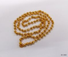 Traditional Ethnic Design 22kt Gold Chain Necklace Gold Beads Jewellery From India, Great Handmade Design, Good For Jewellery Collection. Best Gift Item For Your Loved Ones. Daily Or Party Wear, Easy To Wear. Length - 66 cm (26 inches) We Can Adjust The Length  width - 4 mm weight - 12.250 grams material - 22kt Yellow gold. handmade - yes hallmarked - yes Traditional Gold Beaded Necklaces With Round Beads, Gold Temple Necklace With Gold Beads For Diwali, Gold Necklaces With Polished Beads For Festivals, Gold Round Beaded Necklaces For Celebration, Gold Faceted Beads Necklace For Festive Occasions, Gold Jewelry With Round Beads For Festivals, Gold Beaded Necklace With Faceted Beads For Festive Occasions, Handmade Gold Beaded Necklaces For Puja, Gold Handmade Beaded Necklaces For Puja